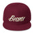 White and gold lettering Snapbacks