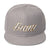 White and gold lettering Snapbacks